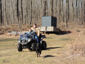 Brad, Otis, and the new boss, Aiden, returning from checking pails.