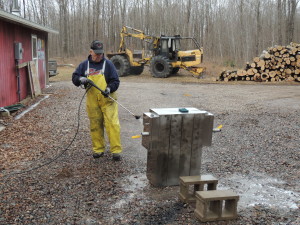 Power washing the evaporator.