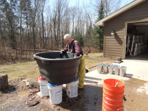 The last clean up task, washing the pails.