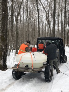 Mike and I dumping our sap into the collection tank.