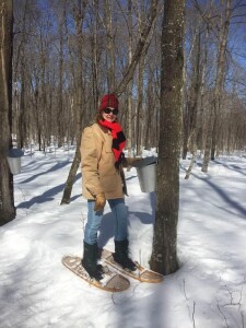 Linda putting out pails and lids on snowshoes.