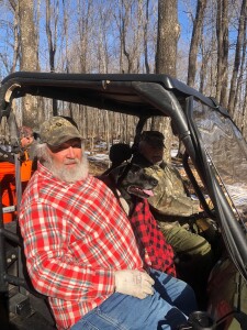 Jimmy, Otis, and Bill filling up the front seat. Otis loves the attention!